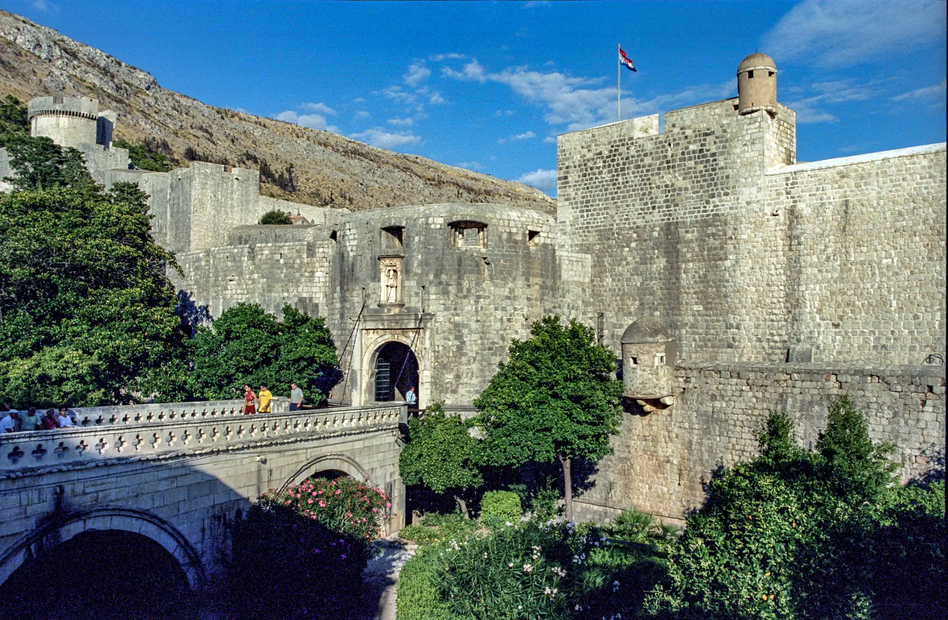 Old stone gates with a bridge