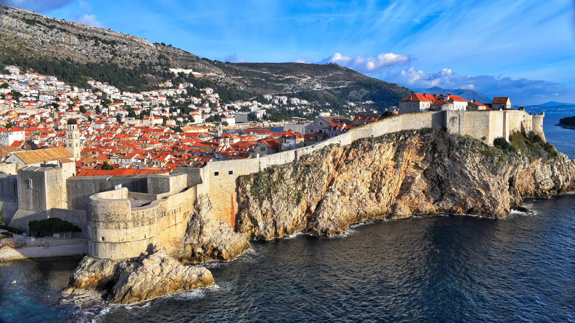 View of a city walls and surrounding sea