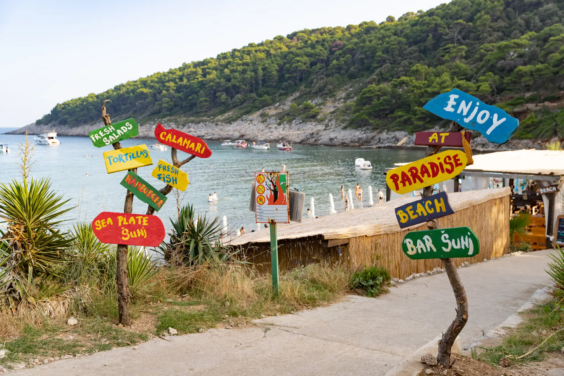 Roads showing signs at the beach