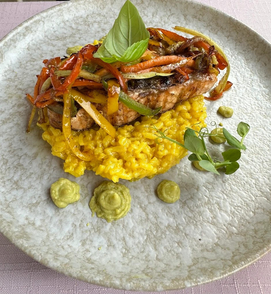 risotto variation with meat and vegetables on a plate