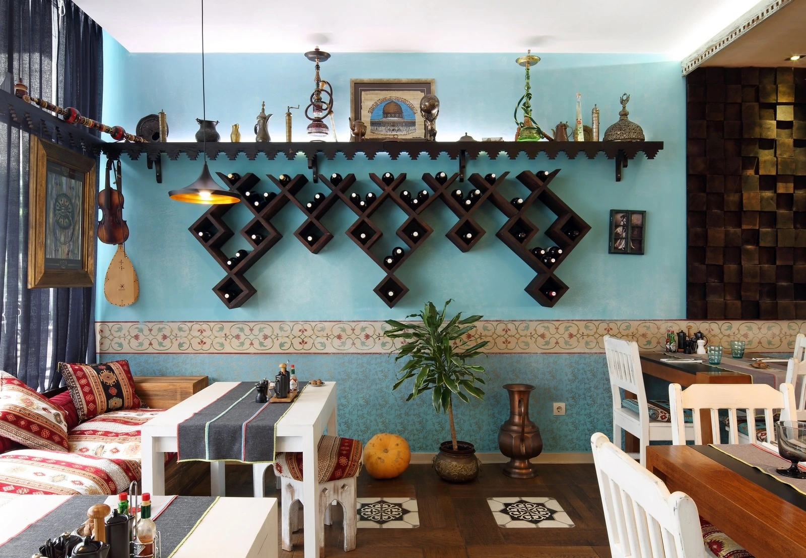 interior of a restaurant with blue walls