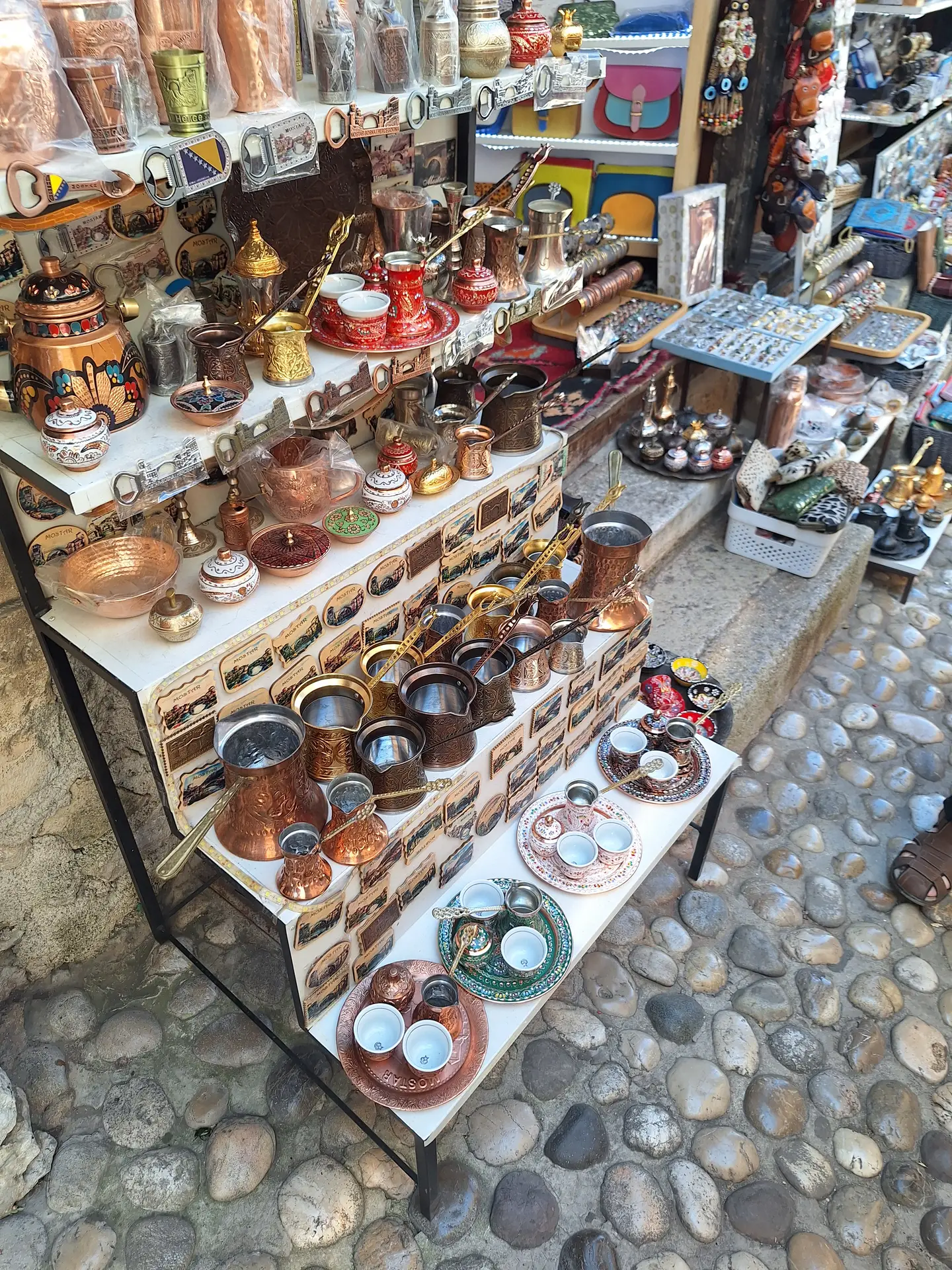copperware selling at a bazaar