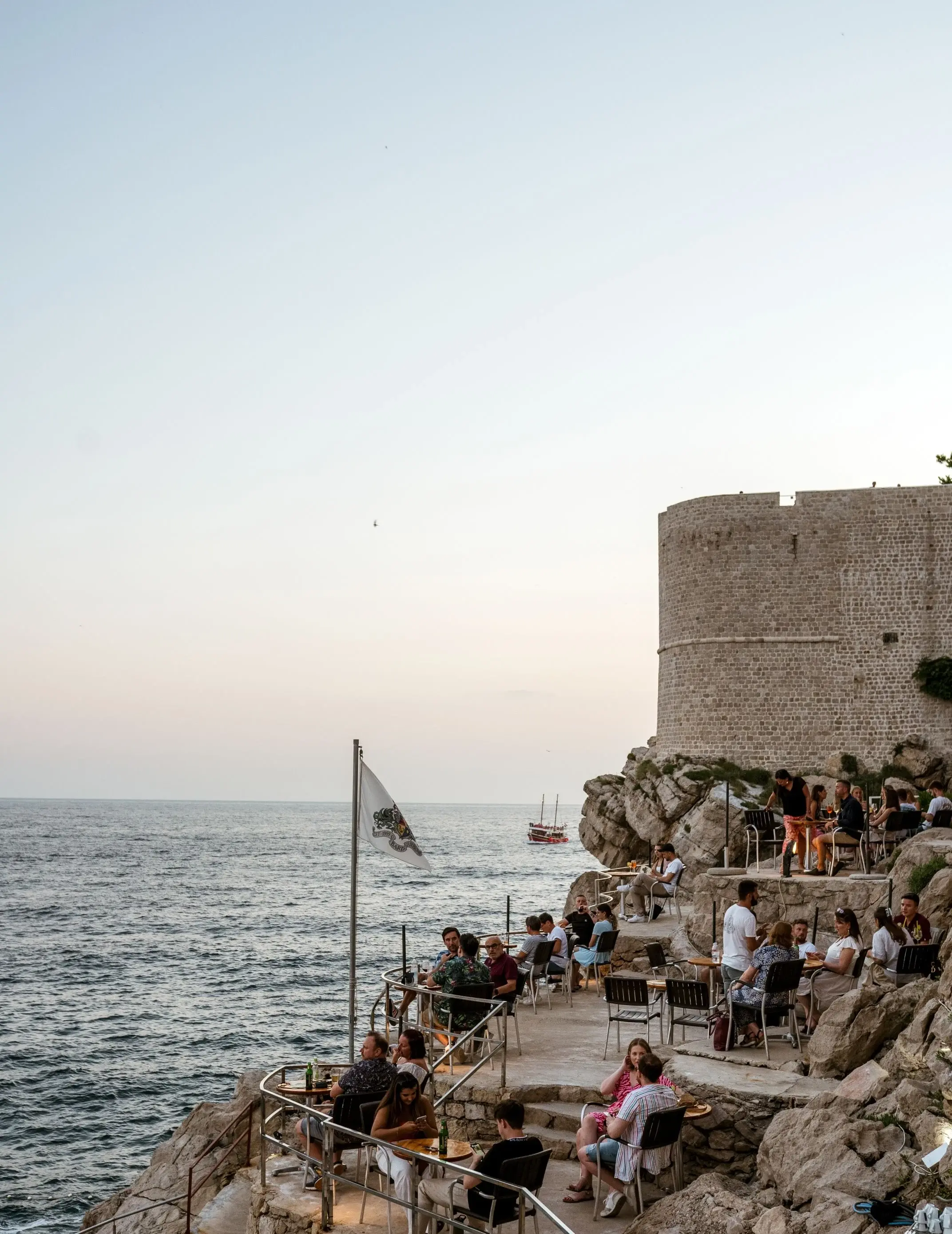 terrace of a bar at the cliff with a sea view