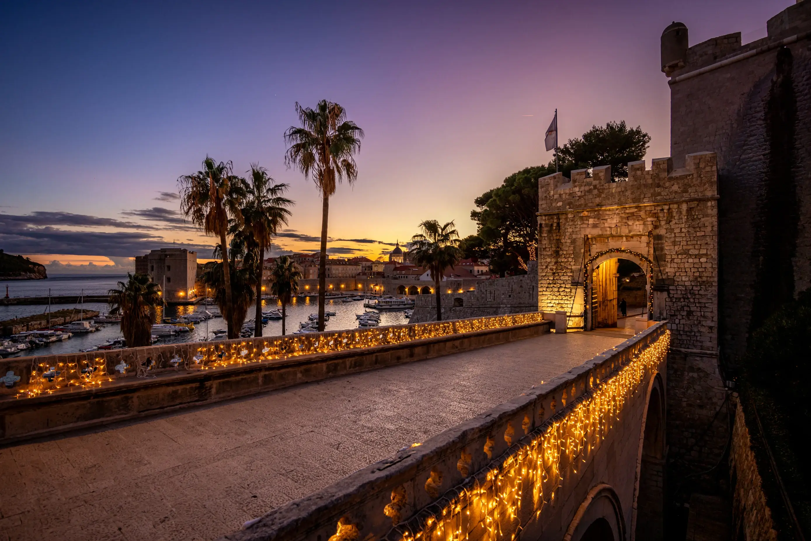 entrance to the old town decorated with lights